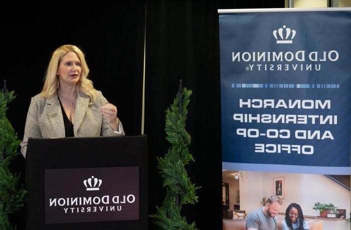 Woman speaking at podium